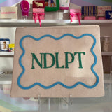The Needlepoint Canvas Pouch