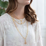 Monogram charm, A