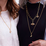Monogram charm, A