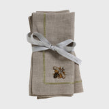 Stripey bee linen dinner napkins, flax, set of two