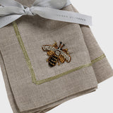 Stripey bee linen dinner napkins, flax, set of two