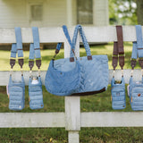 Light Denim HydroBag® with Gold Hardware and Denim overlaid Vegan Leather Strap